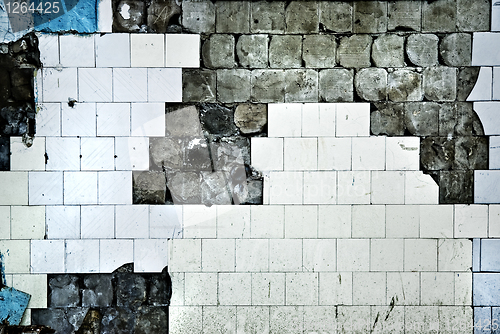 Image of texture of the old tile wall with cracks