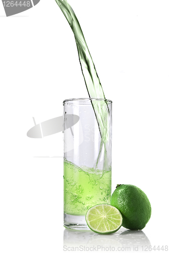 Image of lime juice with lime isolated on white