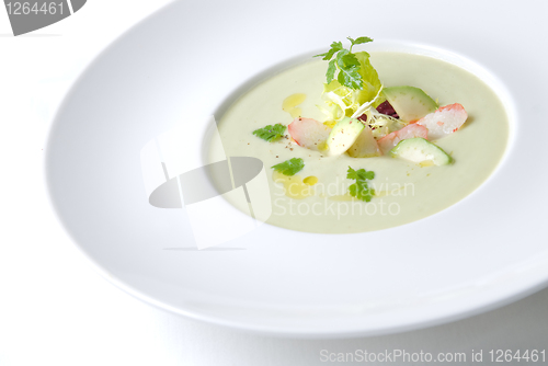 Image of cold soup with crab on the plate