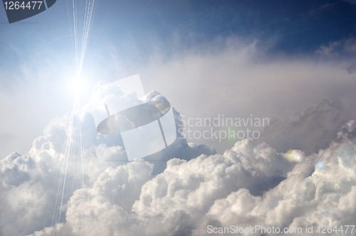 Image of dramatic storm clouds with sun