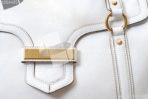 Image of macro of luxury white leather female bag