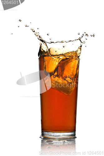 Image of Beautiful splash of cola in glass isolated on white