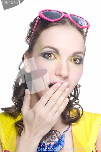 Image of Portrait of a surprised beautiful woman on white