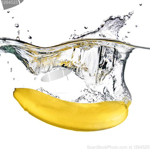 Image of banana dropped into water isolated on white