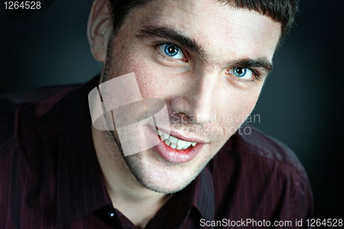 Image of portrait of young smiling man