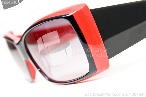 Image of Red female sunglasses isolated on white