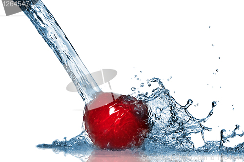 Image of Red apple and water splash isolated on white