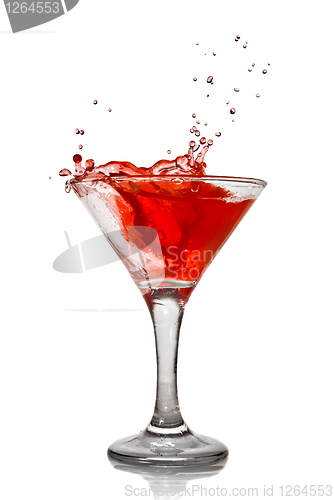 Image of Red cocktail with splash isolated on white