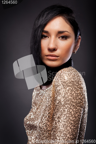 Image of Portrait of sexy woman with long hair on black