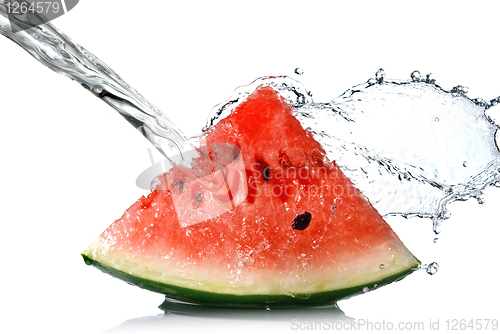 Image of watermelon and water splash isolated on white