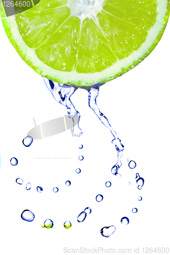 Image of fresh water drops on lime isolated on white
