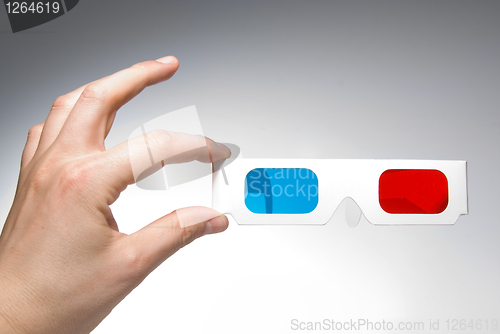 Image of hand holding stereo glasses