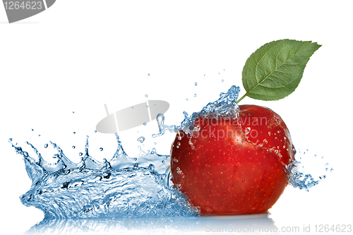 Image of red apple with leaf and water splash isolated on white