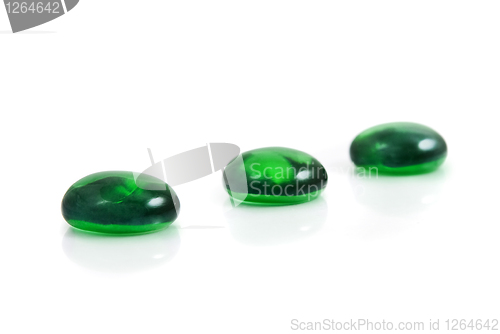 Image of zen-like spa green shiny stones isolated on white