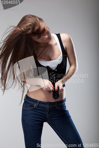 Image of attractive young woman dancing
