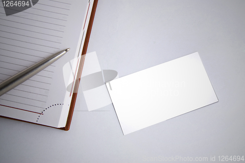 Image of Empty business card with diary and pen