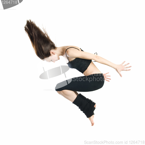 Image of jumping young dancer isolated on white background