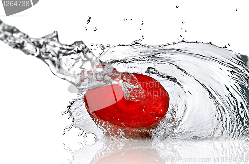 Image of red beet with water splash isolated on white