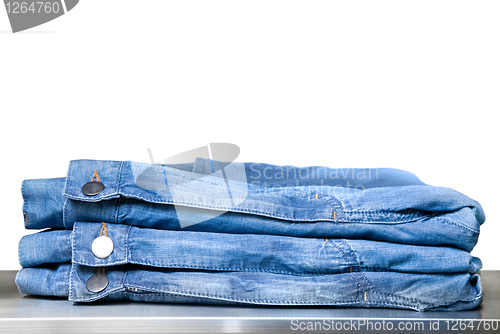 Image of blue jeans in store isolated on white