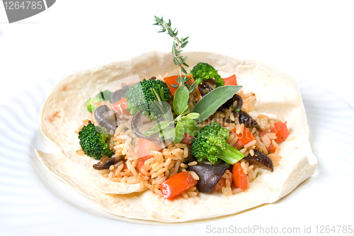 Image of risotto with vegetables isolated on white