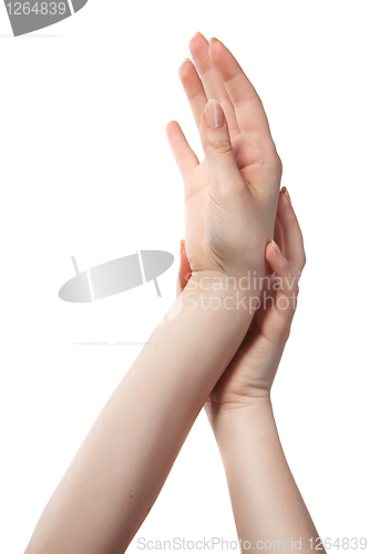 Image of figure from female hands isolated on white