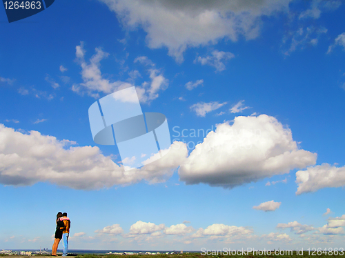 Image of couple against blue sky