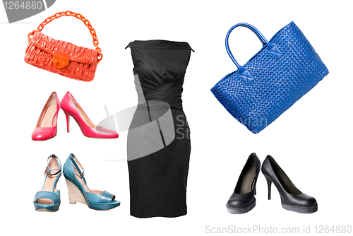 Image of set of female shoes, dress and bags isolated on white