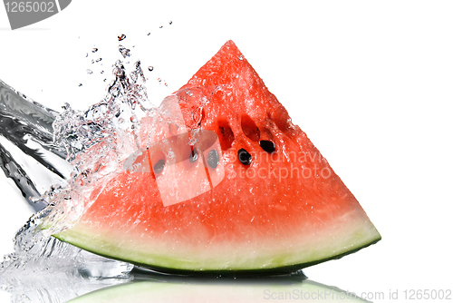 Image of watermelon and water splash isolated on white
