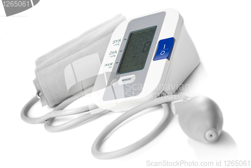 Image of Automatic digital blood pressure monitor isolated on white