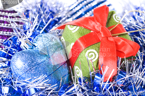 Image of christmas balls with and gift with decoration