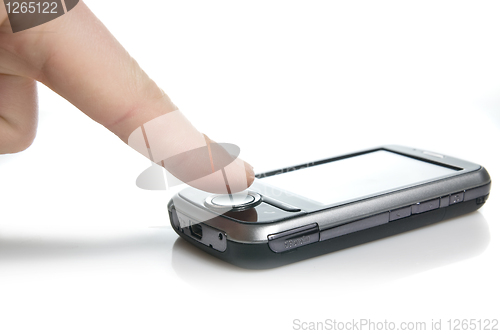 Image of finger and pda with touch screen isolated on white