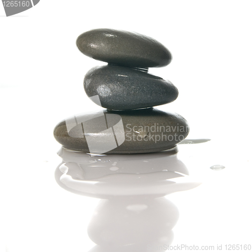 Image of Spa stones with reflection isolated on white