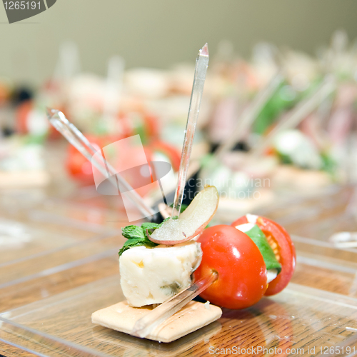 Image of appetizer from tomato and cheese