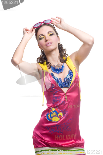 Image of Beautiful young woman in color wear on white