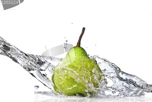 Image of fresh water splash on green pear isolated on white