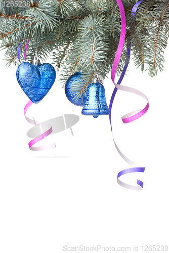 Image of Christmas balls and decoration on fir tree branch isolated on wh