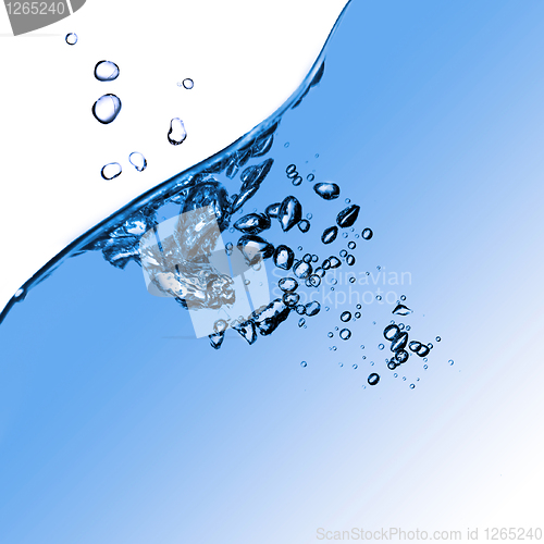 Image of water splash with bubbles isolated on white