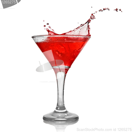 Image of Red cocktail with splash isolated on white