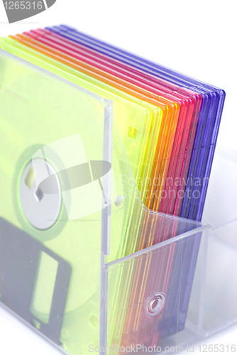 Image of Color floppy disks in box isolated on white