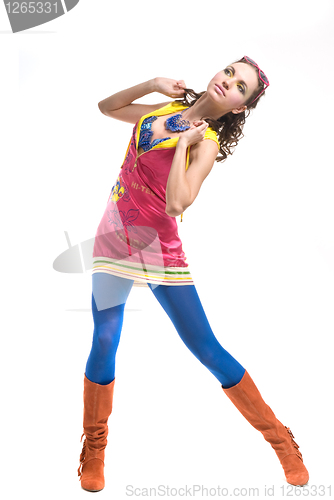 Image of Beautiful young woman in color wear on white
