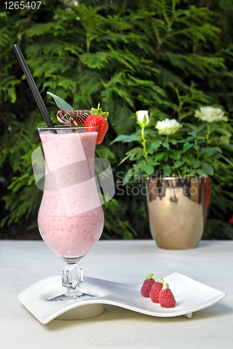 Image of strawberry milkshake on the table