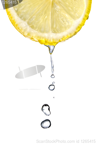 Image of Fresh lemon slice with water drops isolated on white