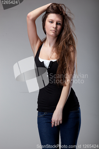 Image of attractive young woman dancing