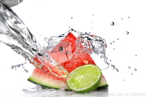 Image of watermelon with lime and water splash isolated on white