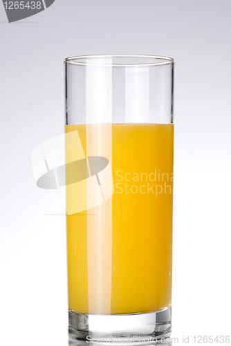 Image of glass of orange juice on white