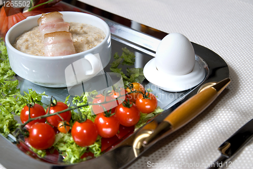 Image of Close up english breakfast with egg