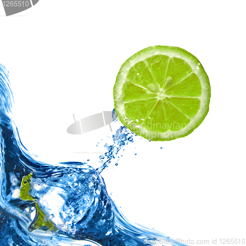 Image of Fresh lime fly out from blue water isolated on white