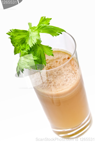 Image of fresh juices from carrot and parsley in glasses isolated on white