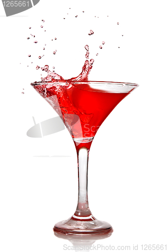 Image of Red cocktail with splash isolated on white