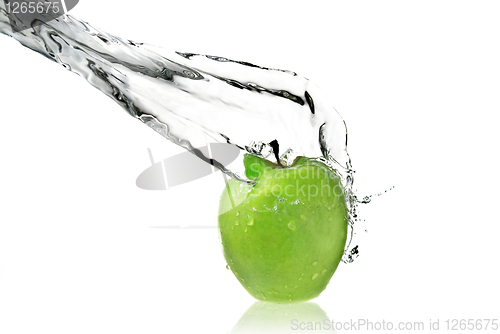 Image of fresh water splash on green apple isolated on white